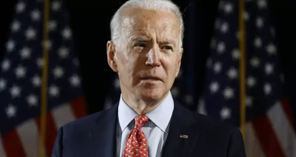 biden_pose_apnews-scaled