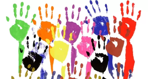 stock-photo-raised-hands-in-acrylic-paint