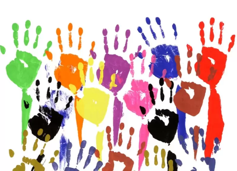 stock-photo-raised-hands-in-acrylic-paint