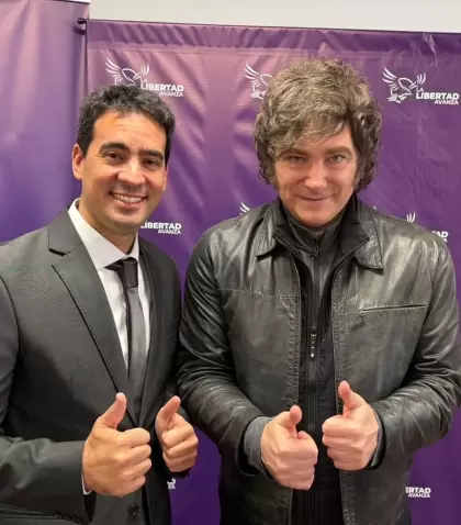 El diputado nacional Adri�n Ravier y el presidente Javier Milei, en 2025.